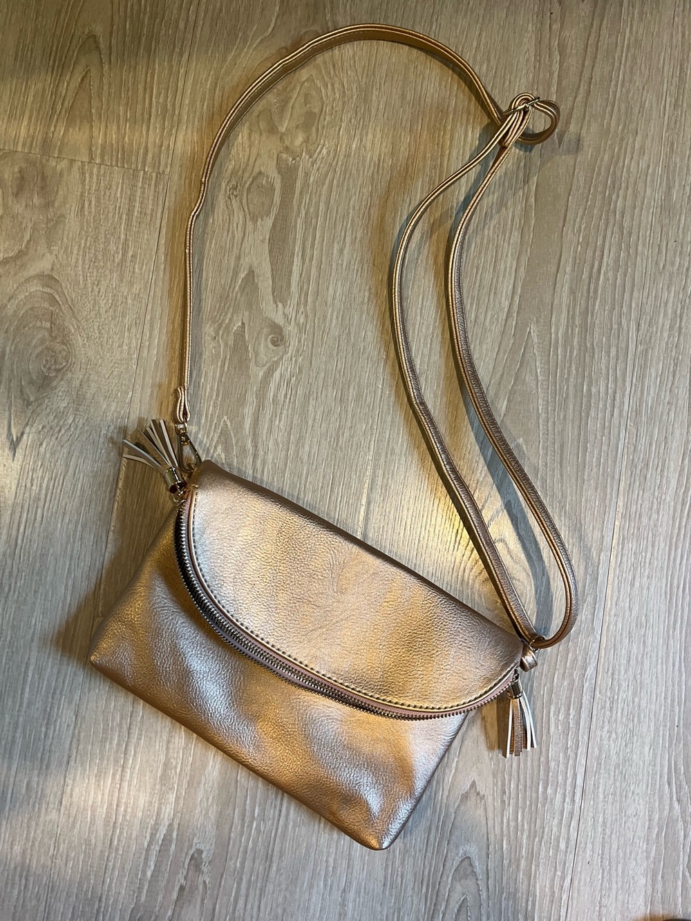 Metallic Bronze Crossbody Clutch with Tassel Detail
